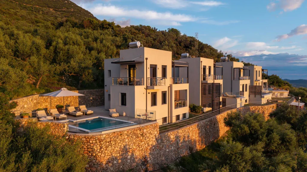 Kalma villas and private pool on the stone terraces of Verga at sunset